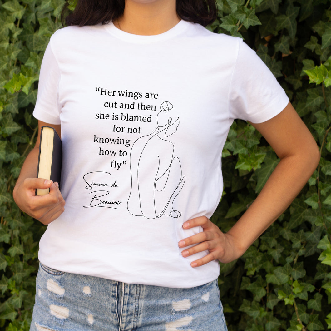 Camiseta blanca mujer de la colección Quotes & Co con ilustración de silueta de mujer y cita de Simone de Beauvoir.