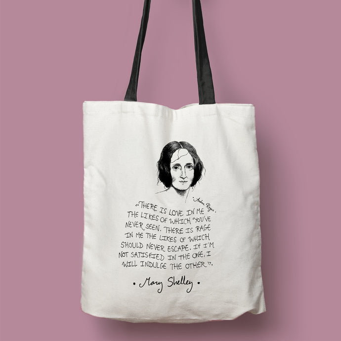 Tote bag natural con asa negra con ilustración y cita de Mary Shelley en inglés.