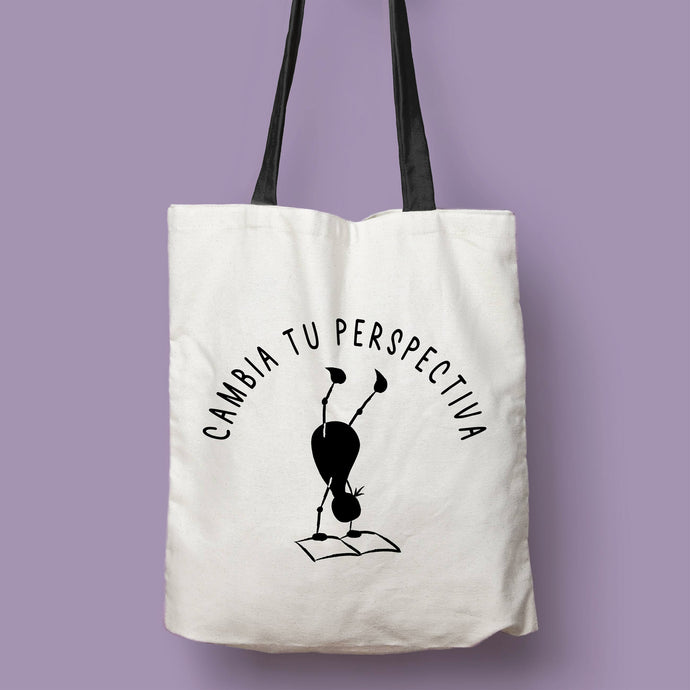 Tote bag natural con asa negra con la ilustración del personaje Lectorix y el texto 